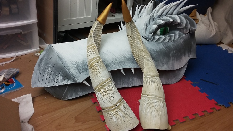 horns leaning against dragon head