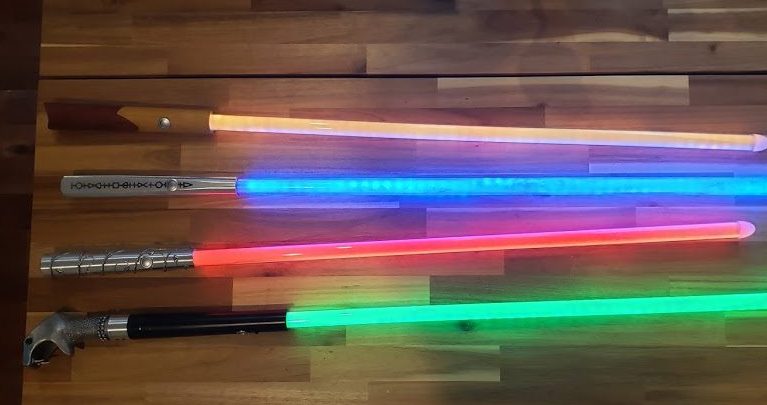 Four lightsabers based on wands from the harry potter series of movies