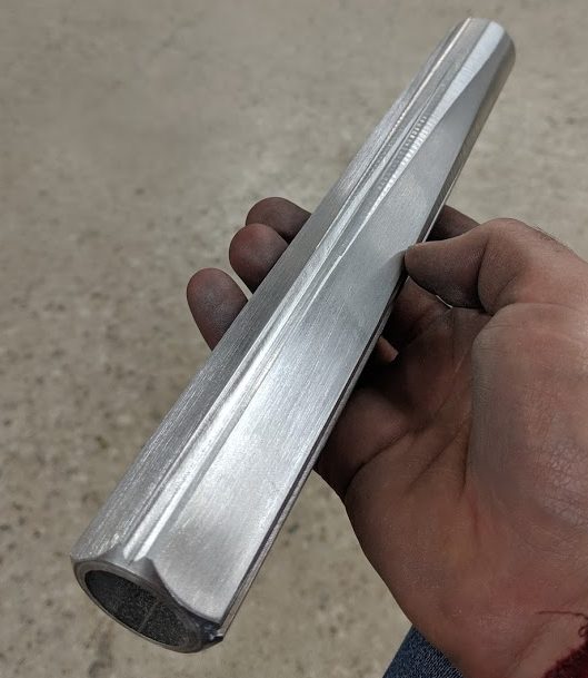 aluminum wand hilt, with sides machined flat
