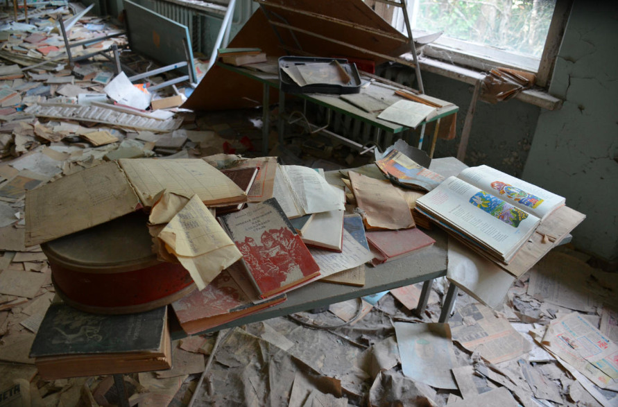 Books cover the floor at Pripyat primary school